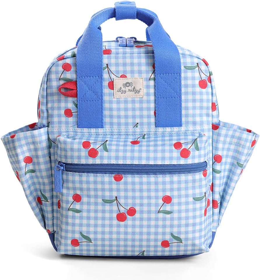 A blue checkered backpack featuring a cherry print, with two sturdy handles and a front zip pocket.