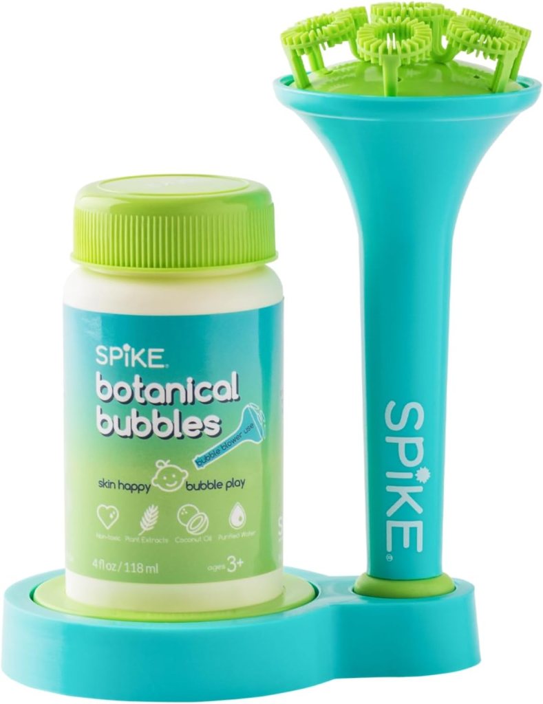 A bubble blower kit featuring a green tube with bubble-making components and a bottle of SPIKE botanical bubbles next to it, designed for children aged 3 and up.