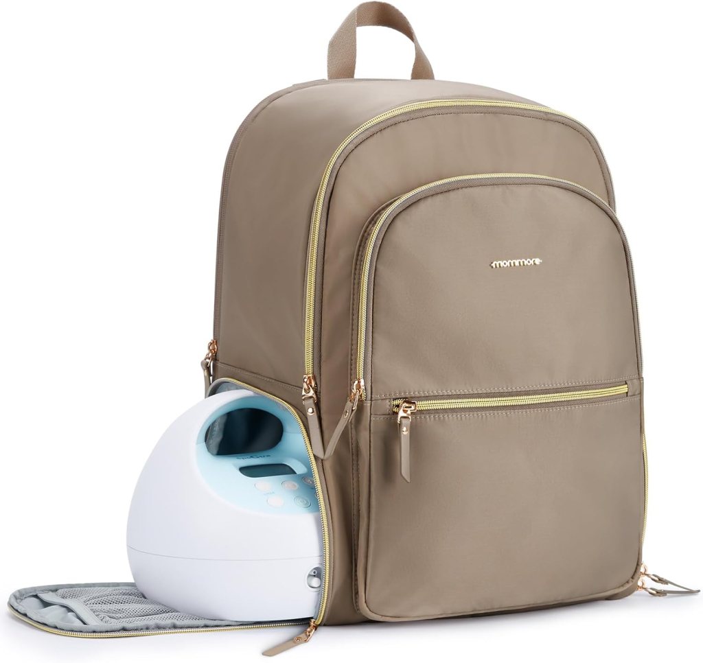 A stylish beige backpack with gold zippers, featuring a breast pump partially visible at the front, designed for parents on the go.