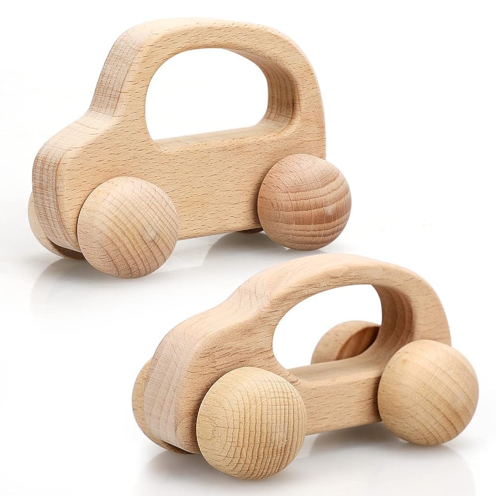 Two wooden toy cars with rounded shapes and wheels, one on top of the other.